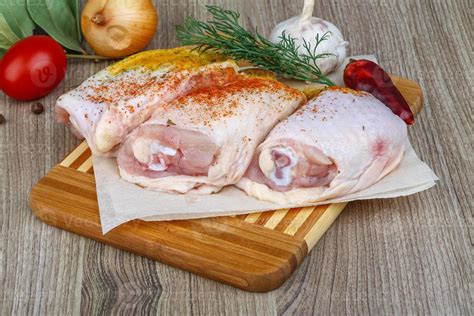 Raw chicken thighs 8437651 Stock Photo at Vecteezy