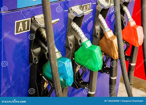 Fuel Pump, Gas Station, Gasoline.Colorful Petrol Pump Filling Nozzles ...