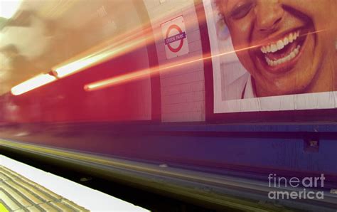 Underground Tube train zooms into Green Park station, London, England ...