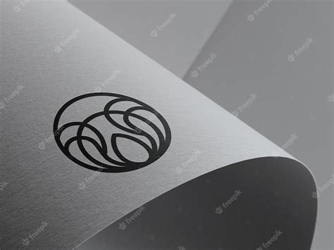 Premium PSD | Logo mockup on hard curved paper