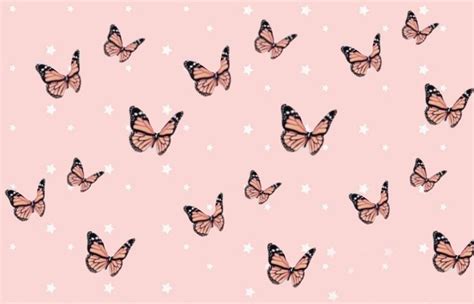 a pink background with lots of butterflies flying in the air and stars all over it