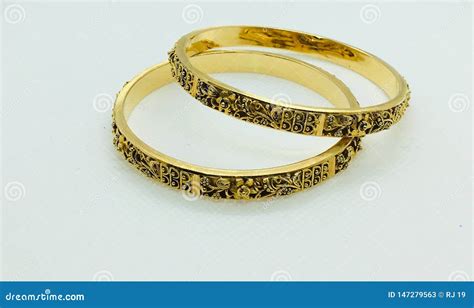 Gold Bangles Stock Photos - Download 2,249 Royalty Free Photos