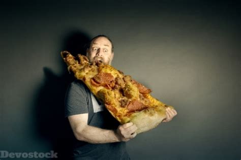 Devostock Funny Man Eating Very Huge Pizza Hungry 4K - Devostock ...