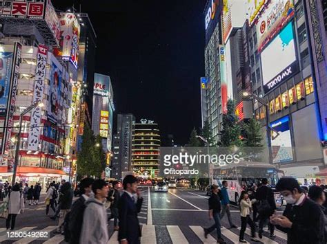 Tokyo Street Crossing At Night In Akihabara High-Res Stock Photo - Getty Images