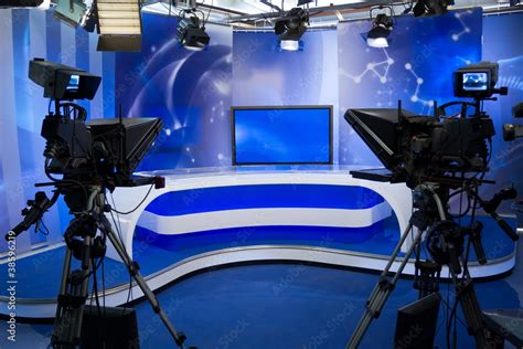 TV studio with camera and lights Stock Photo | Adobe Stock