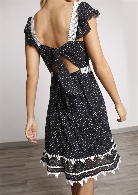 Short black polka dot dress