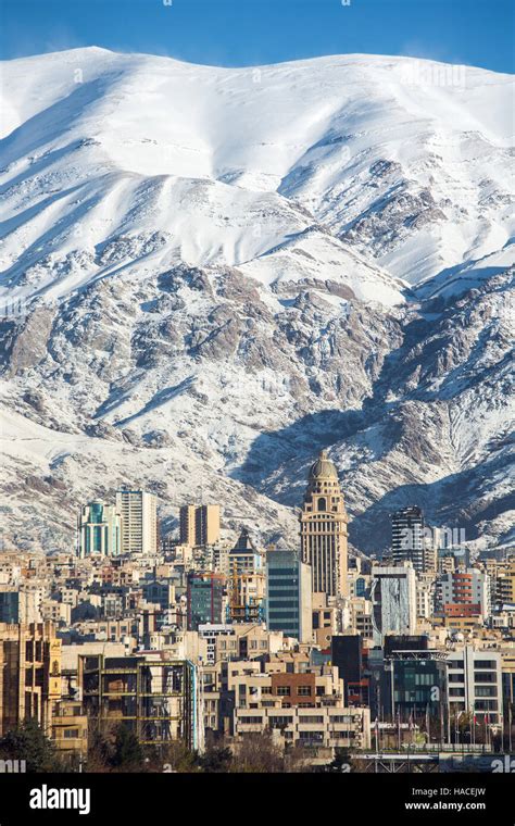 Winter Tehran view with a snow covered Alborz Mountains on background ...