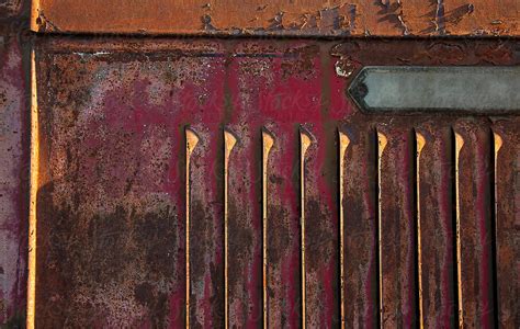 "Rusted Metal Vent Texture" by Stocksy Contributor "Ryan Matthew Smith" - Stocksy