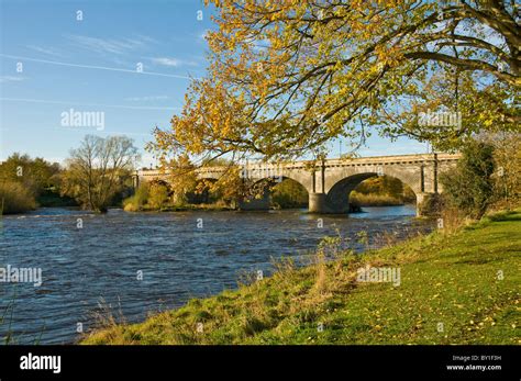 Autumn colours beside the River Tweed and Tweed Bridge Kelso Scottish ...