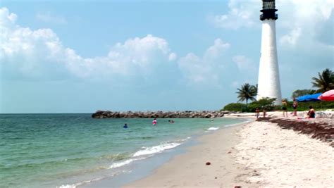 Biscayne Bay Lighthouse On A Beautiful Day, Surrounded By Palm Trees ...