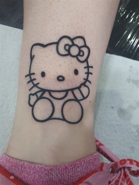 So happy with my beautiful hello kitty tattoo. Came out even better than I could have hoped ...