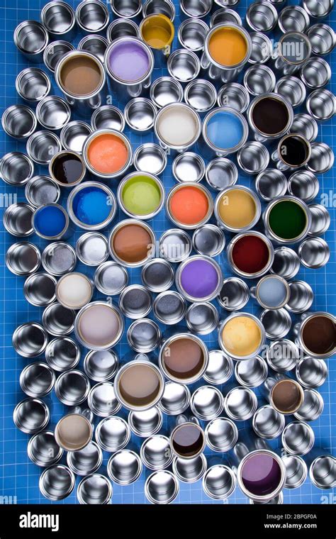 Metal cans with color paint Stock Photo - Alamy