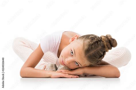 elegant little ballerina stretching isolated on white background Stock Photo | Adobe Stock