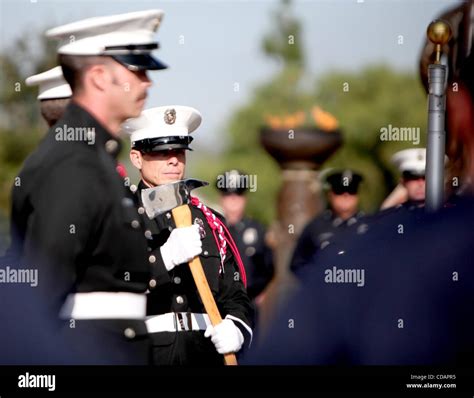 Sep 11, 2010 - Irvine, California, U.S. - Orange County Firefighter WAYNE POWELL holds a ...