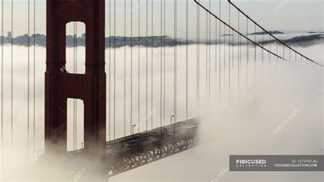 Golden Gate Bridge in fog — connection, usa - Stock Photo | #137478146