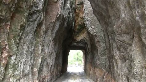 A narrow tunnel on Needles Highway (SD87) in South Dakota. - YouTube