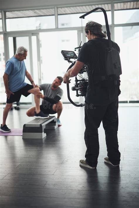 Getting Closer and Closer. Behind the Scenes Shot of a Camera Operator ...