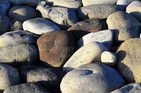 Pebbles at the beach 18858869 Stock Photo at Vecteezy