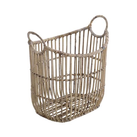 “This natural rattan basket is the on-trend accessory you need for ...