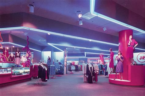 A "modern," neon'ed out 80s mall store. Medan, 80s Interior, Interior Shop, Interior Design ...