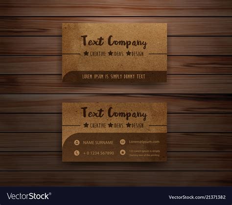 Recycled paper business cards on wooden background