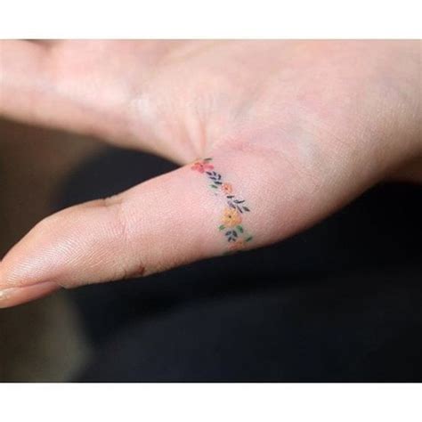 Flower Ring | Cute finger tattoos, Finger tattoos, Tiny tattoos