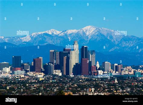 Snow covered San Gabriel Mountains behind downtown Los Angeles Stock ...