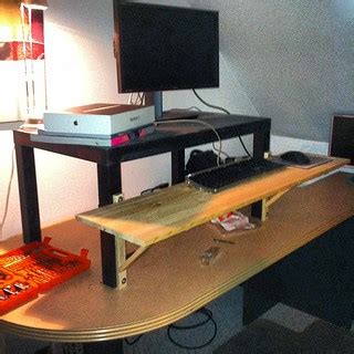 Standing desk hack a success. $20 in random bits and piece… | Flickr