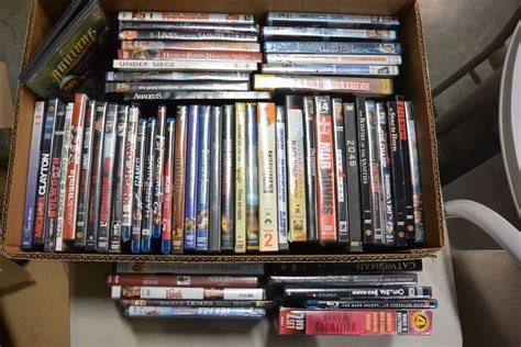 BOX OF DVDS AND BLURAYS