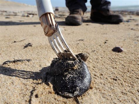 Mysterious Tar Balls Return, Shutting Down Long Beach | Breitbart