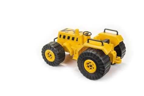 Yellow Tractor Toy for Child on the White Background. Stock Photo - Image of farmer, soil: 114344672