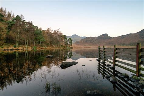 Beautiful Autumn Fall colorful sunrise over Blea Tarn in the Lak Photograph by Matthew Gibson ...