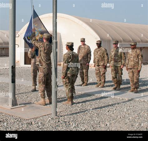 KUWAIT--The New York State Flag is raised at Camp Arifjan, Kuwait on ...