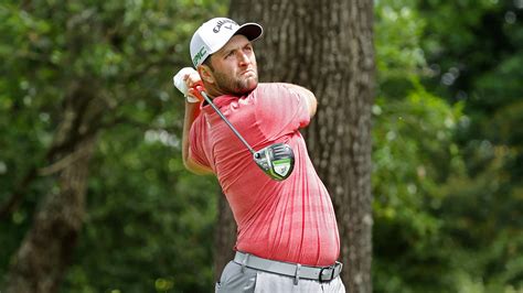 Jon Rahm of Spain plays a stroke from the No. 2 tee during the final round of the Masters at ...