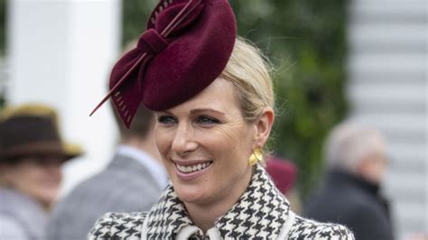 Zara Tindall pairs her houndstooth coat with funky red accessories at ...