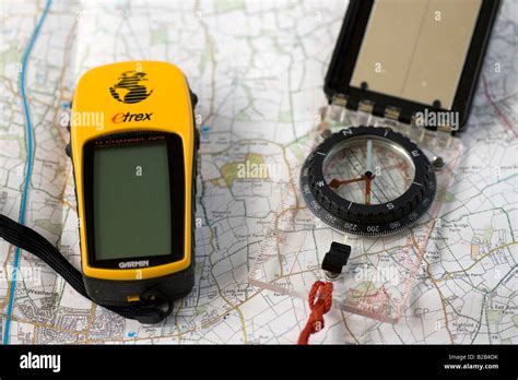 Map compass and GPS Stock Photo - Alamy