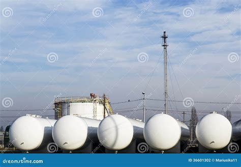 Natural gas storage tanks stock photo. Image of truck - 36601302