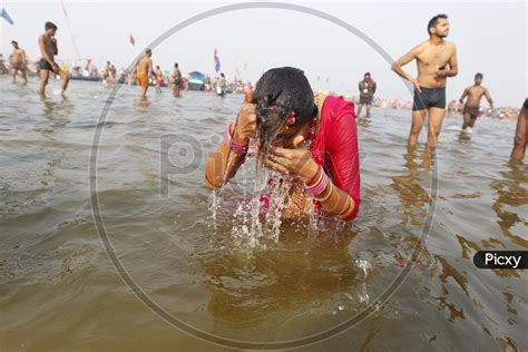 Image of Hindu Devotees Taking Holy Bath In Triveni Sangam At Prayagraj ...