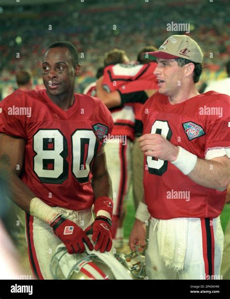 NFL FILE: Jerry Rice (80) and Steve Young (8) of the San Francisco 49ers during Super Bowl XXIX ...