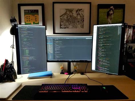 Amazing coding setup! shared by @nerdytitan New setup. 3 monitors for coding is bit over kill ...