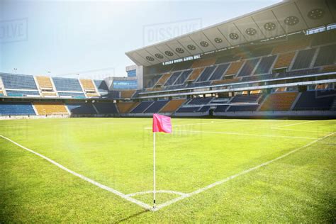 Empty soccer field and stadium - Stock Photo - Dissolve