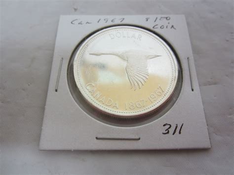 Canadian Silver Dollar 1967 - Schmalz Auctions