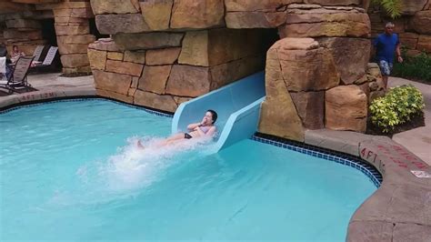 Walt Disney World Dolphin Resort - The Grotto Pool Waterslide - YouTube