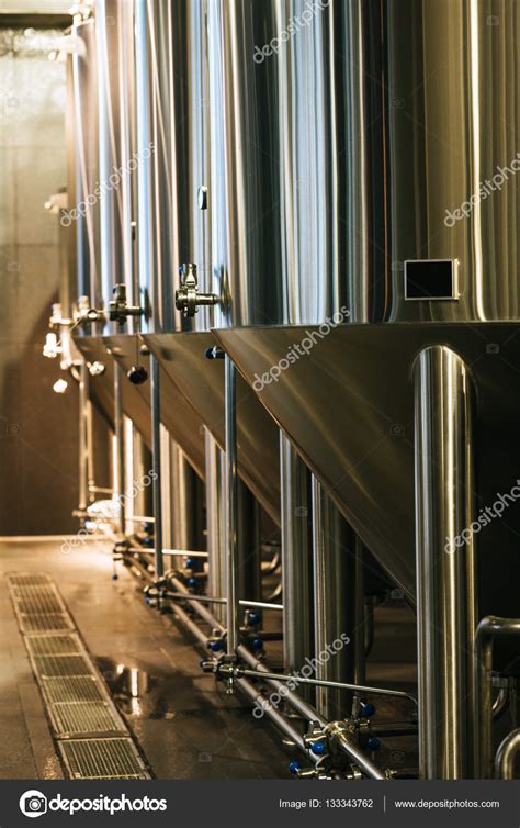 Modern brewery equipment Stock Photo by ©ArturVerkhovetskiy 133343762