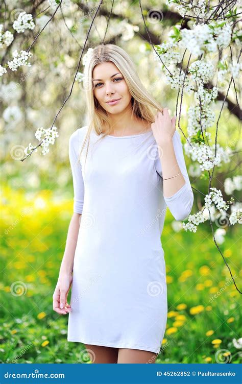 Portrait of the Young Beautiful Smiling Woman Outdoors Stock Photo ...