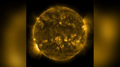 Huge solar flare captured in stunning NASA image as it fires off from ...