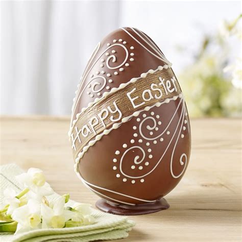 Milk Chocolate Happy Easter Egg | £14.95 | A Swiss milk chocolate egg, hand-piped in white ...