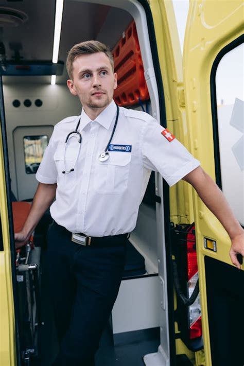 Man Driving an Ambulance · Free Stock Photo