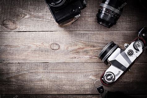 Old lens and camera. Stock Photo by ©cegli.o2.pl 101810250