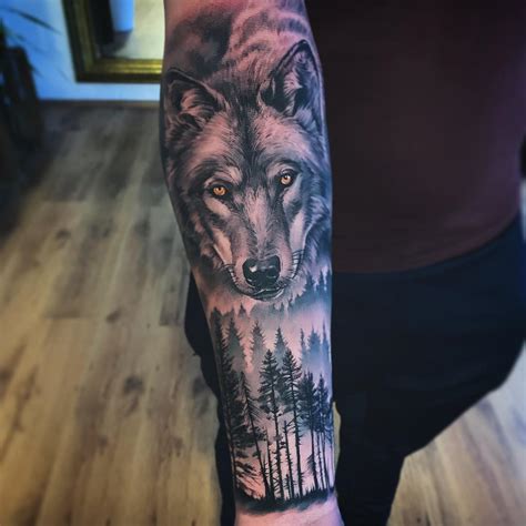 Wolf and Forest Tattoo on Forearm